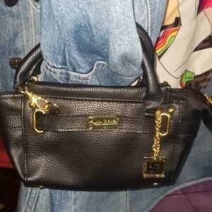 Stylish Black Mini Bag with Gold Accents